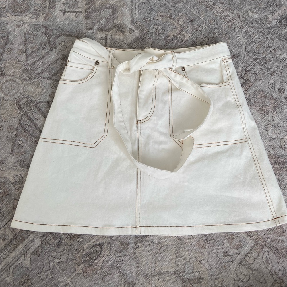 White denim skirt from Lulus. Tags removed but never worn